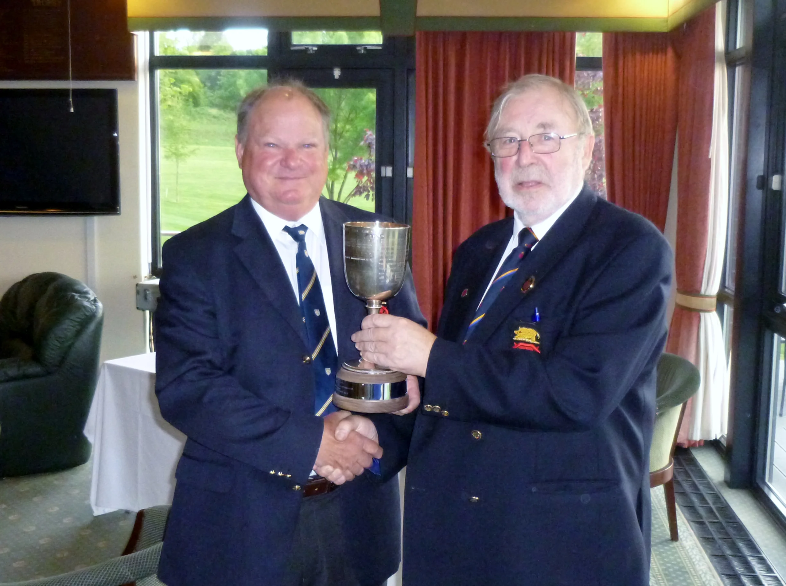Mew retains Seniors title